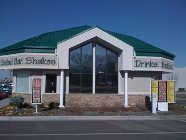 Warrens restaurant in West Point Utah with Suntek IDS 20% film installed on east side