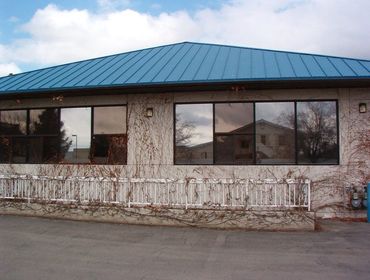Office building in Layton Utah with 20% bronze film installed on east side of building.