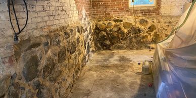 Melrose stone foundation in need of repairs and restoration.