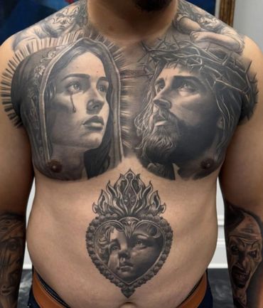 Religious-themed full chest tattoo with Jesus and Virgin Mary.