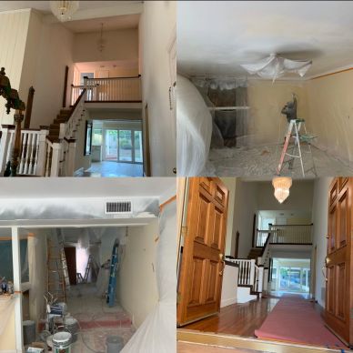 Home interior renovation in progress with dust protection and ladder setup.