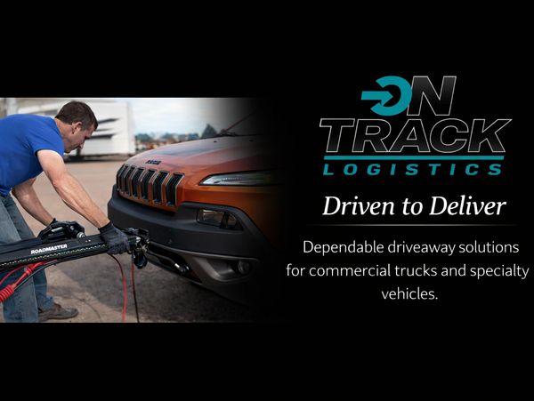 Man hooking a vehicle to a tow system for logistics service.