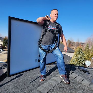 Quick and easy method for lifting and carrying solar panels.