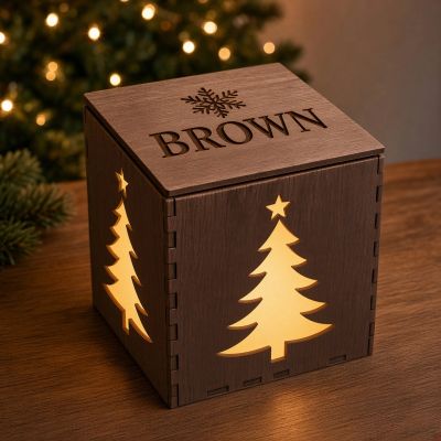 Wooden Christmas cube light with tree cutouts and BROWN engraving.