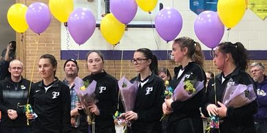 Balloons and bouquets at parents/ senior night recognition at Pentwater Public School.