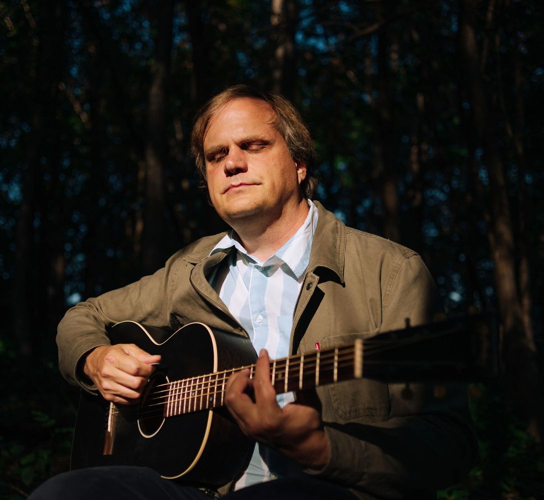 Matthew Hope playing guitar