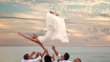 Bride flying through the air