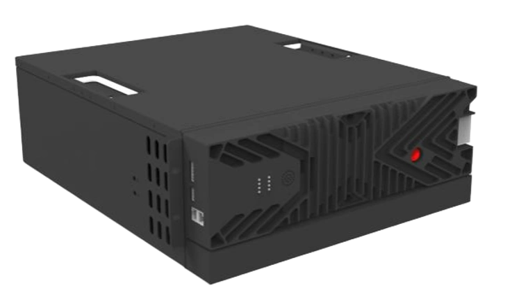 Compact black external hard drive with vented design and USB ports.