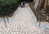 During installation of granite paver walkway in Opio