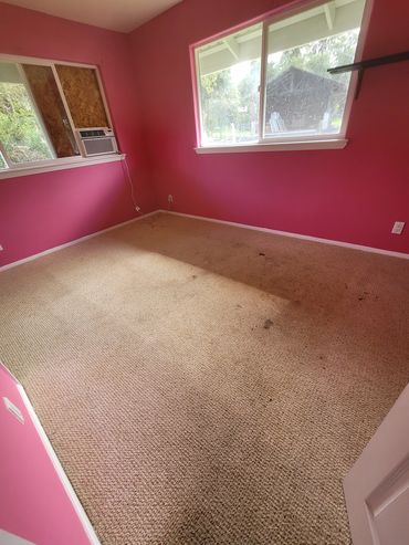 Donato Project; Pink room needs new paint, new flooring and new base trim.