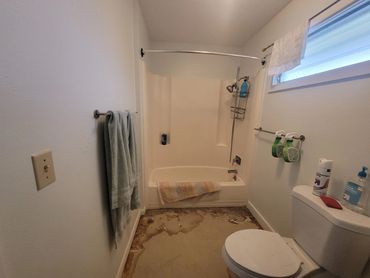 Haber Project; Bathroom upgrade needed. New Flooring, new vanity, new shower unit and a stackable wa