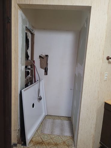 Van Dussen Project; Client fired his handy man and asked us to finish the job, installing a shower u