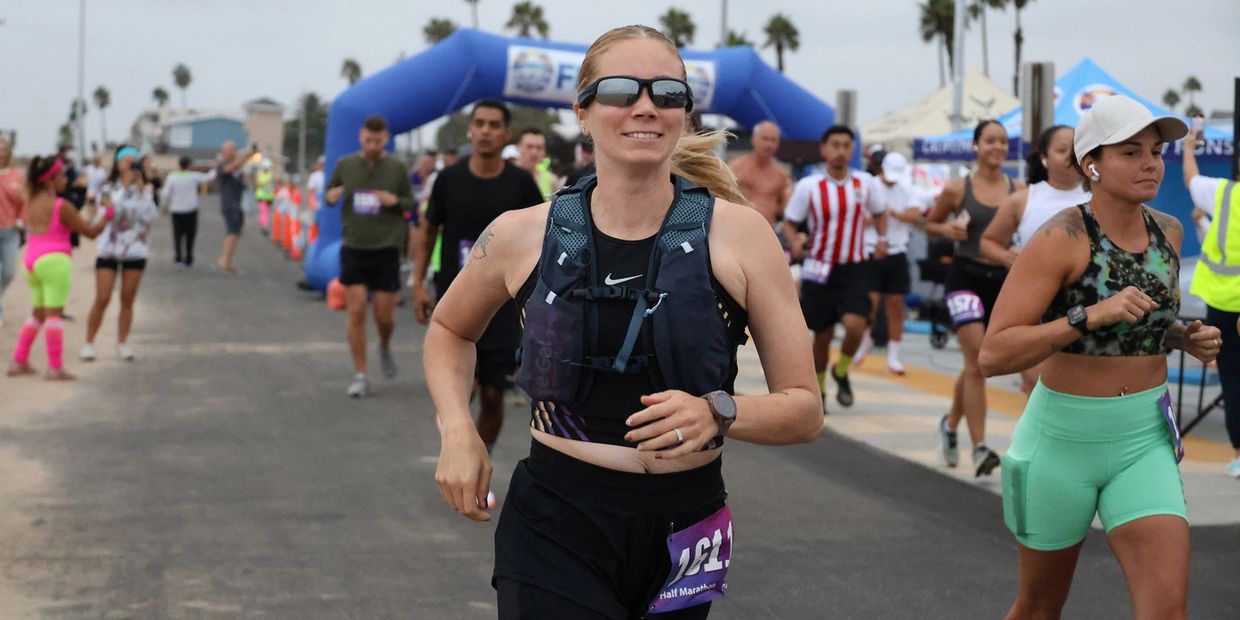 Runners participating in a lively outdoor half marathon event.