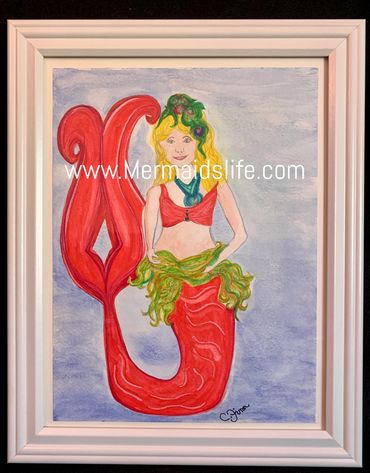 Lovely
Lovely
Red is a rare colored mermaid.
She is usually found around sunset body surfing.

