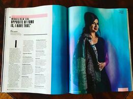 Open Fast Company magazine, picture of Dona on the right and the article on the left