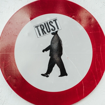 The word 'trust' written in a red  circle