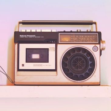old boom box with cassette tape and radio