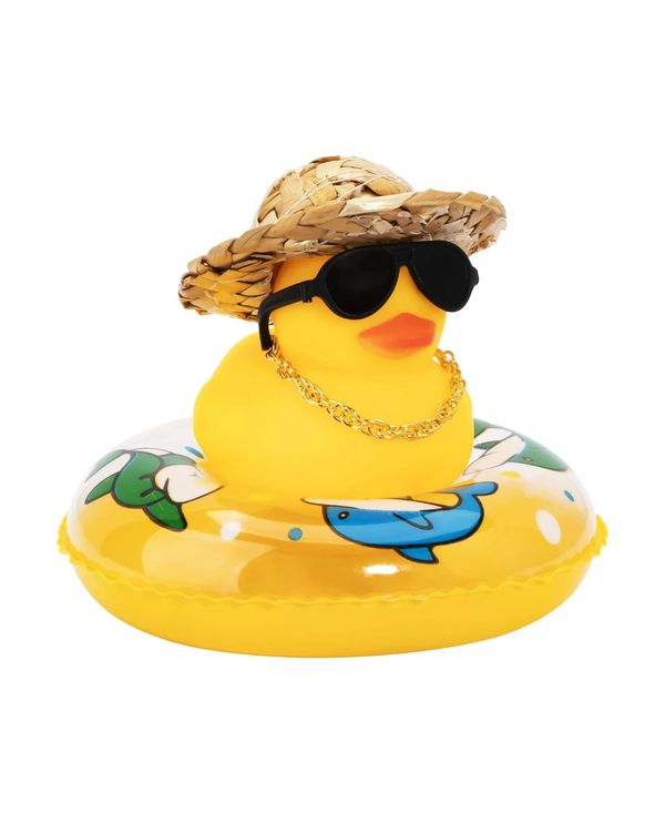 Adorable rubber duck with beach hat and sunglasses on a raft.