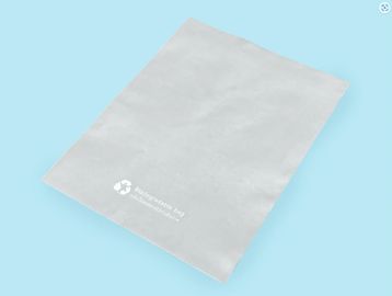 A plain white plastic pouch on a blue background.