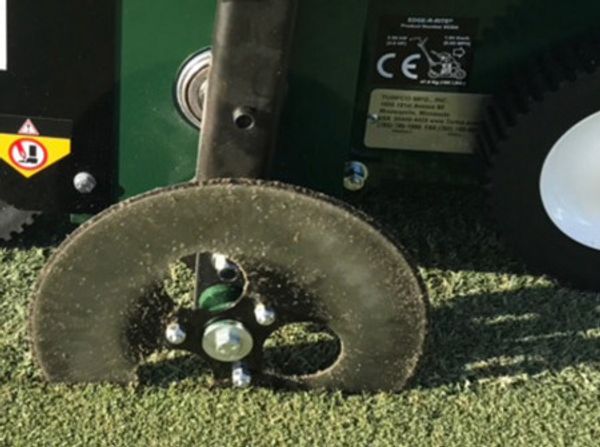 Close up on the precision of the initial cut of the sod cutter.