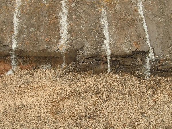 Water Wick Drainage System installed and showing the depth of impact.