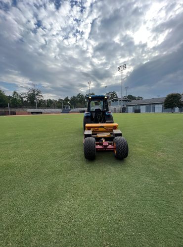 Professional Turfgrass Services overseeding using the Vredo Super Compact.