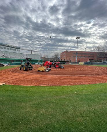 Professional Turfgrass Services laser grading baseball field and ABI force.