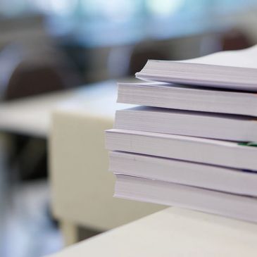 a pile of office paperwork