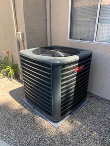 New energy-efficient outdoor air conditioning condenser installation in Murrieta.