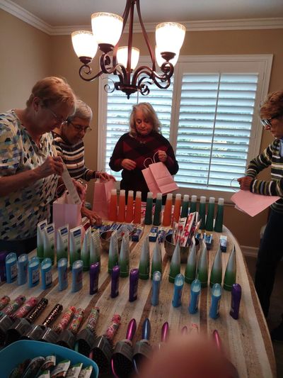 Image Walnut Valley Women's Club members packing veteran care packages