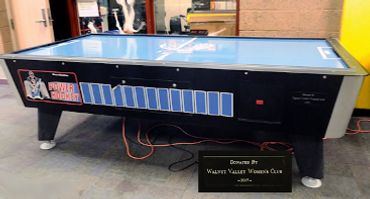 Photo of air hockey table the Club dnated to the Walnut Teen Center.