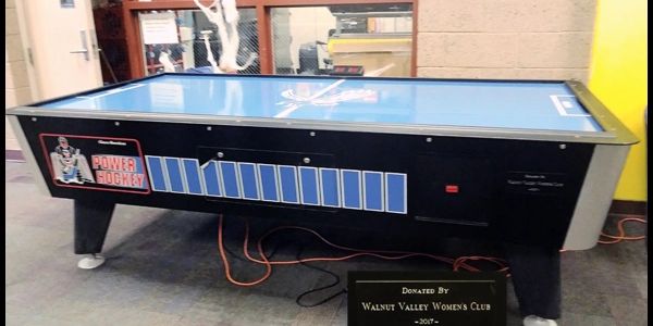 Image of the air hockey table that the Walnut Valley Women's Club donated to the Walnut Teen Center.