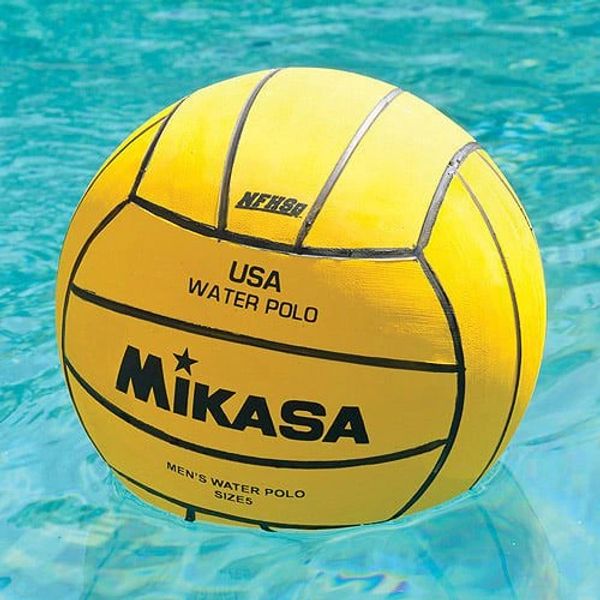 Yellow Mikasa USA water polo ball floating in pool water.
