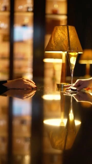 Warmly lit hospitality scene from a Precise Pictures film.