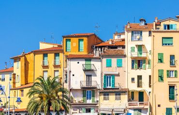 "Menton, Provence"
City homes against an azure blue sky.