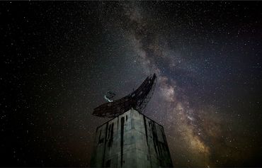 Radar at night against a starry sky.