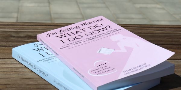 Photo of two books laying on a bench