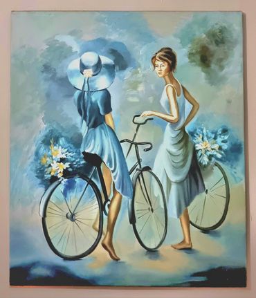 Hand painted painting: 2 ladies in blue riding bicycles