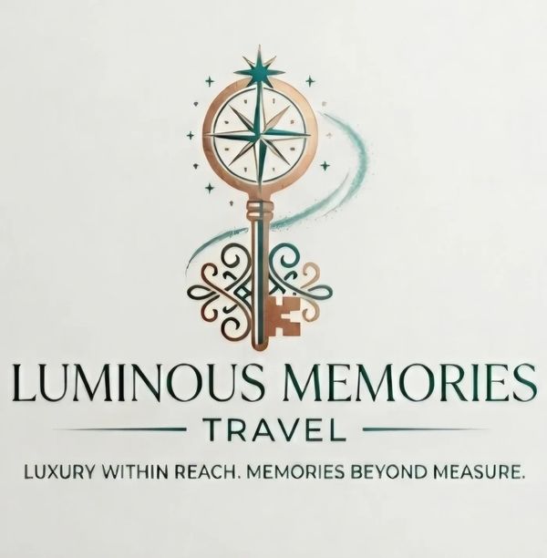 Elegant logo of Luminous Memories Travel featuring a decorative key and compass.