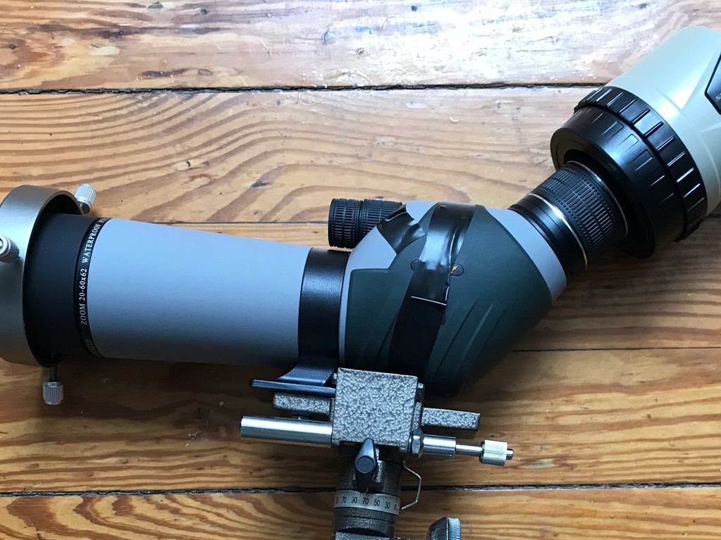 This is a standard 20 to  60  spotting scope and it is used at 20x magnification. The black knob on