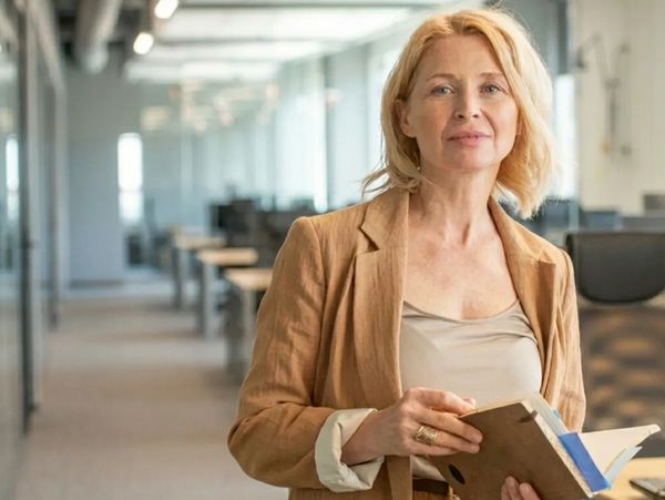Business woman in office _ Own The Room: Imposter Syndrome At The Top Course