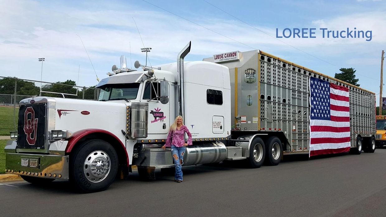Jessica with her Peterbilt & cow wagon for the 4th of July Parade.