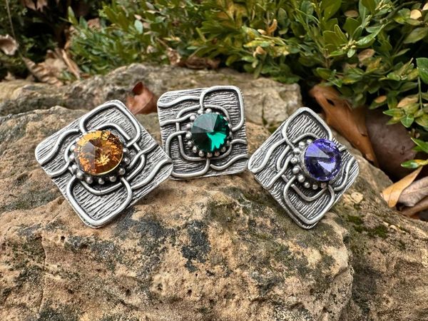 Adjustable zinc and lead free rings with European crystal.  Bling & unique!