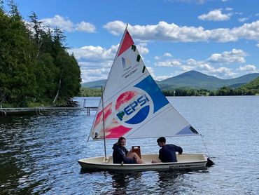 Couple sitting on a boat in the river