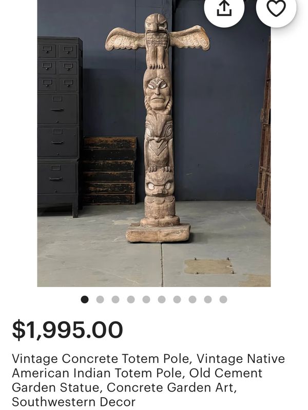 Vintage concrete Native American totem pole sculpture for garden decor.