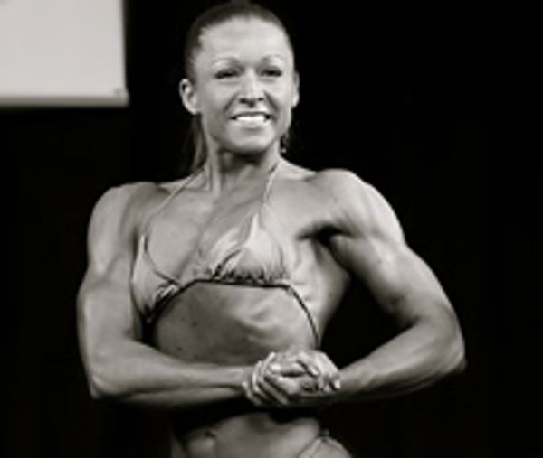 a woman showing her fit body