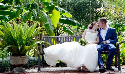wedding couple on a bench