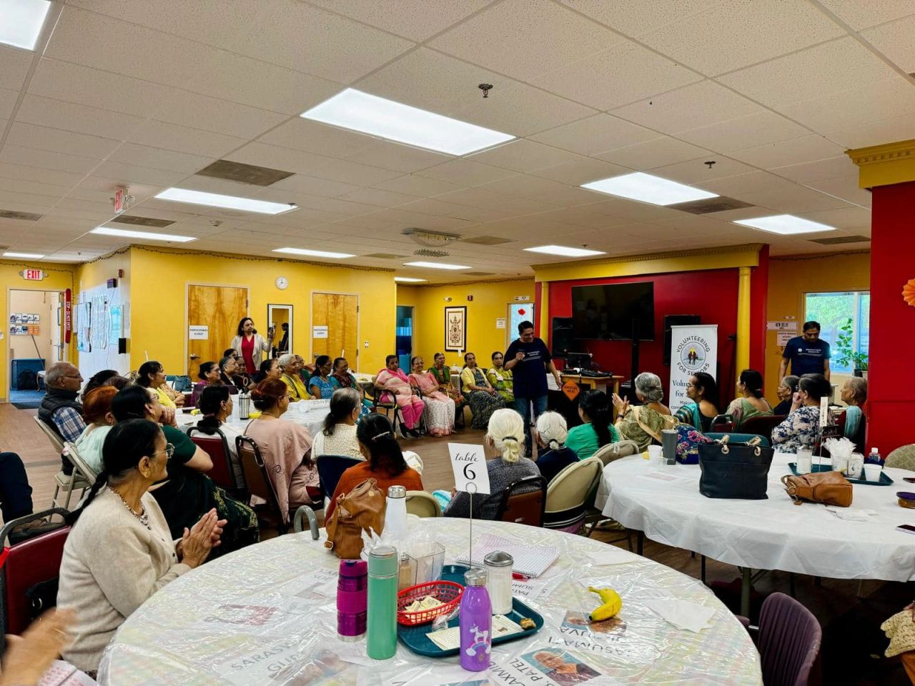 Seniors at adult day care center listening and singing. Seniors at adult day care center listening and singing.