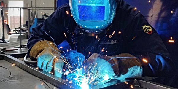 Mig welder in Las Vegas metal shop fabricating a custom project.