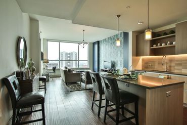 open plan kitchen, living room , feature wall, interior design , kitchen island, barstools , under c